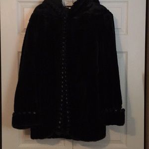 Black furry jacket trimmed in leather